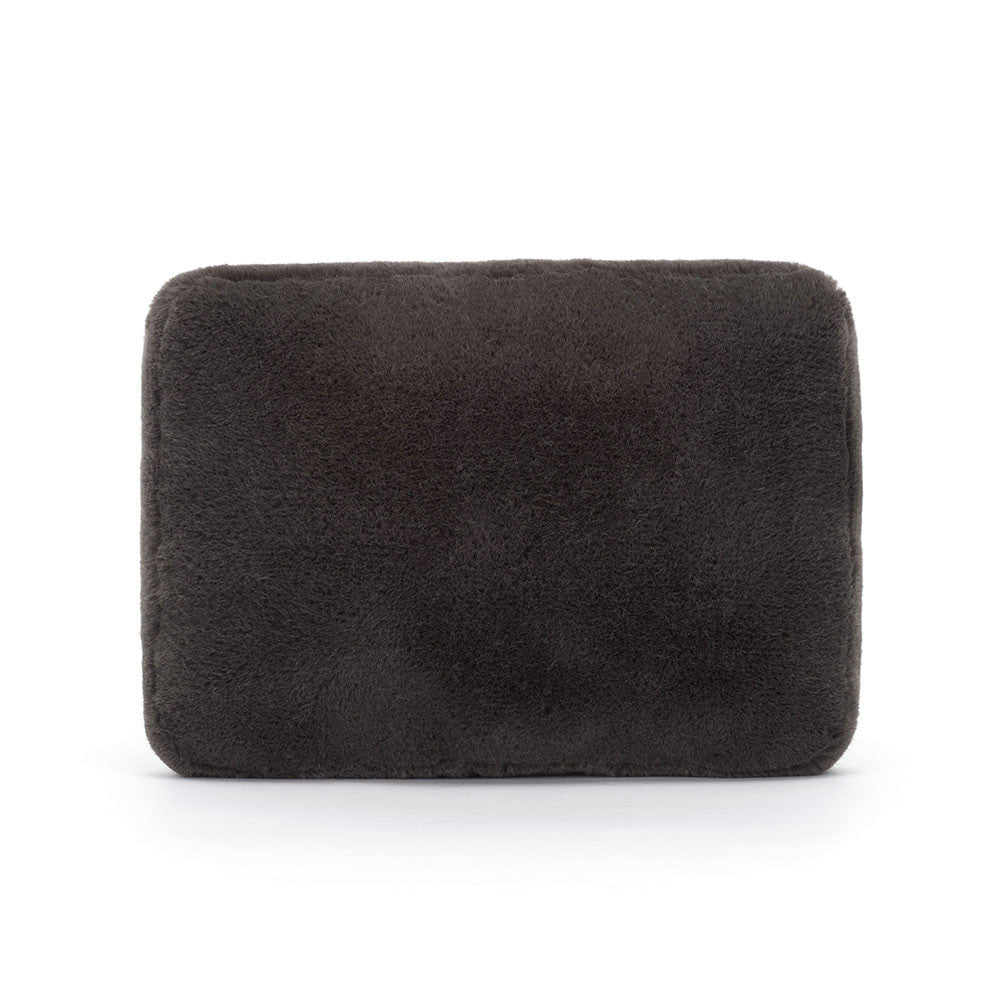 Dos d'une peluche rectangulaire grise.