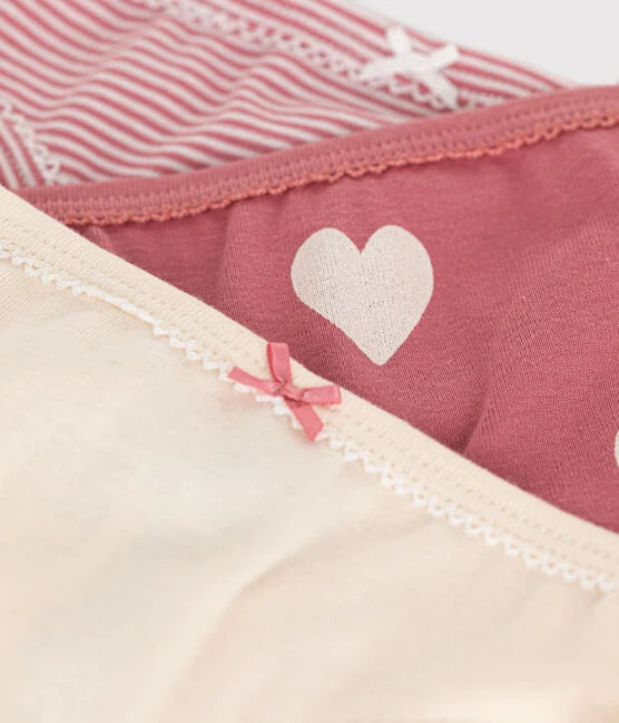 3 culottes superposées avec petite boucle sur le devant.
