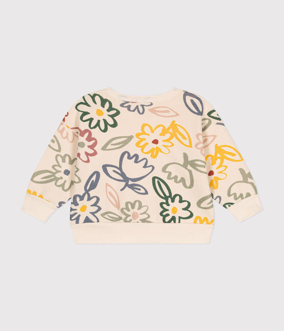 Un sweatshirt pour bébé beige avec un motif de fleurs dessinées colorées.