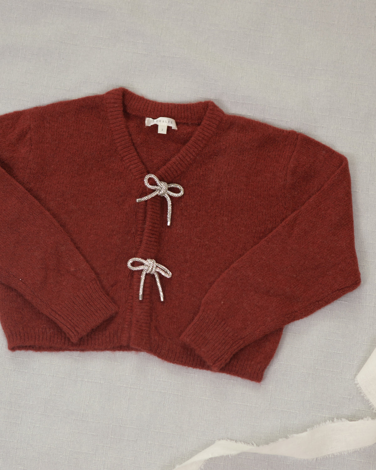 Nora Lee - Bow Cardigan