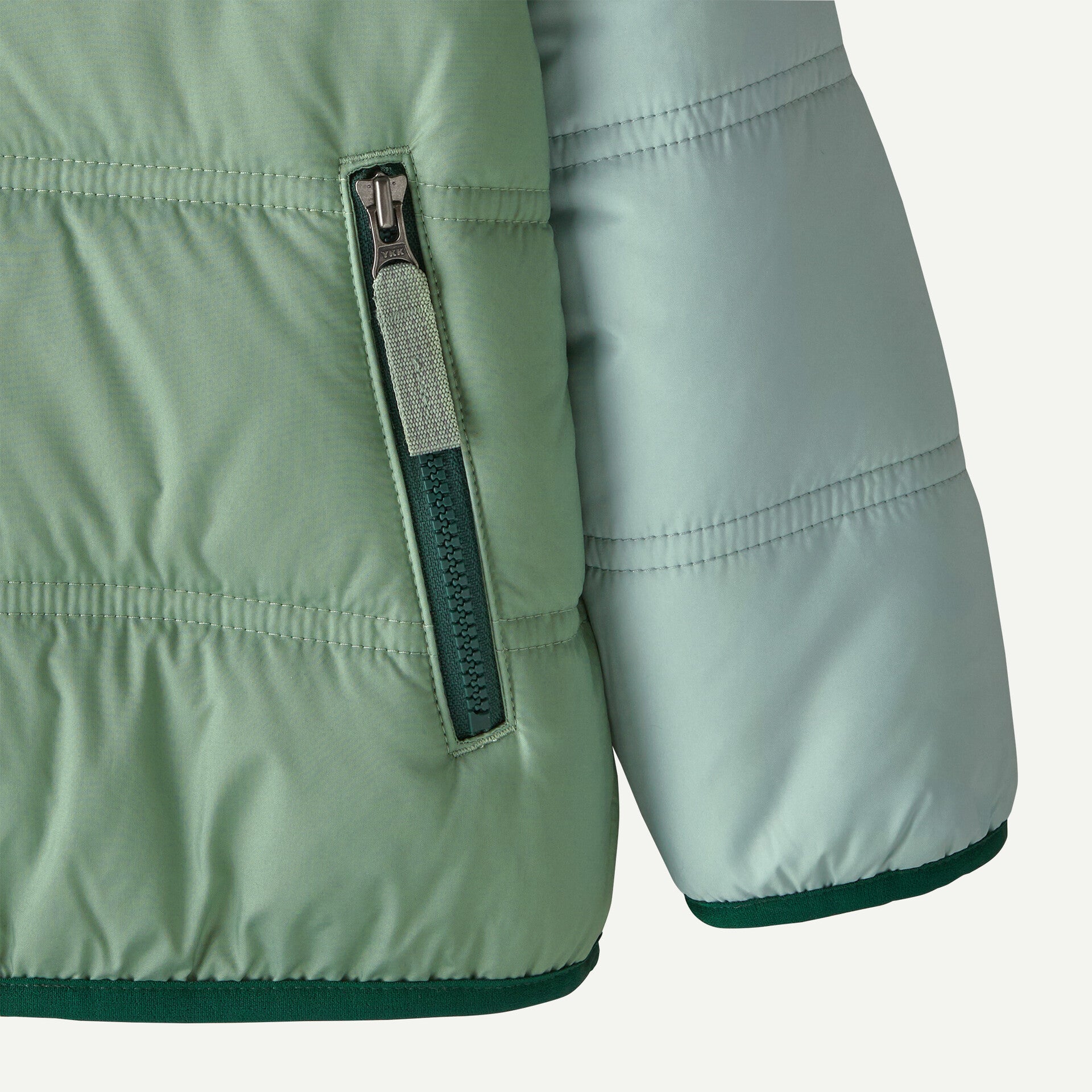 Patagonia - Veste à Capuche Baby Reversible Tribbles
