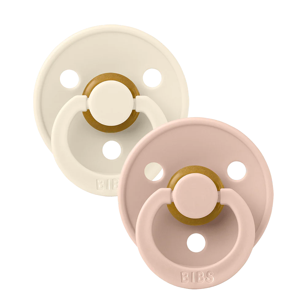2 suces superposées, une rose pâle et une crème. Elles ont 3 trois sur le disque.