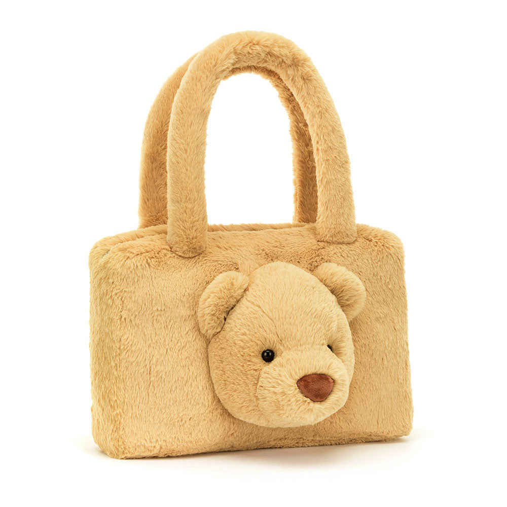 Sac tote en peluche beige avec une tête d'ourson en 3D sur le devant.