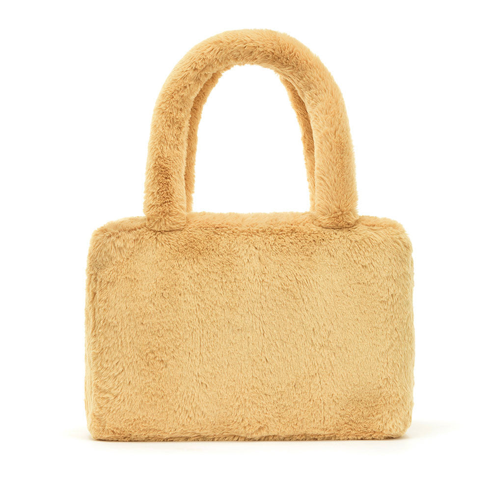 Sac tote en peluche beige vu de dos.