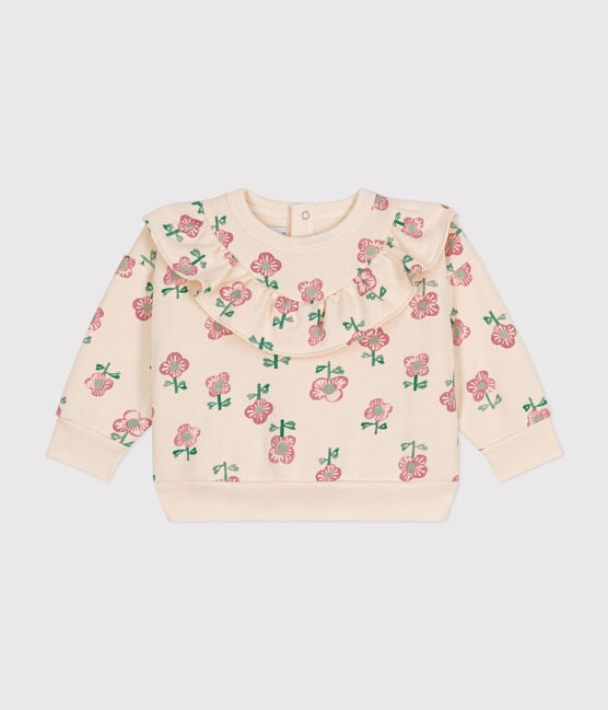 Un sweatshirt beige à motif imprimé de roses, avec un col popeline.